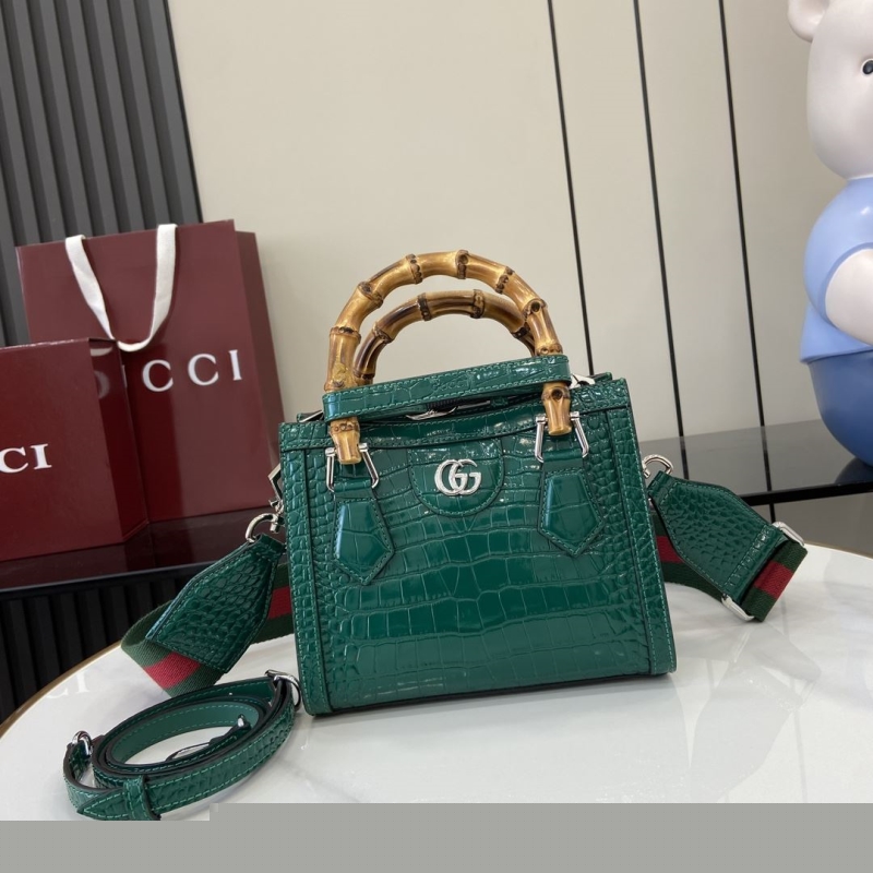 G*u*i top handle bags